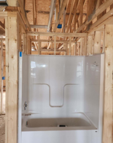 A and D Plumbing installed shower Bathtub combo in construction site