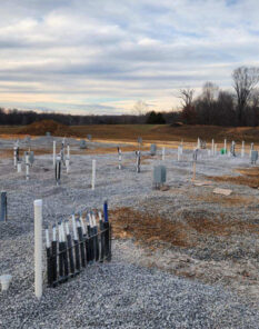 A and D plumbing construction site with plumbing rough-ins in place.